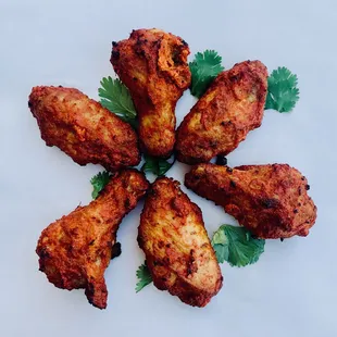 a plate of chicken wings