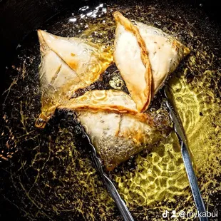 a frying dish with chicken