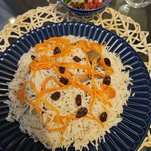 Lamb with rice and carrots