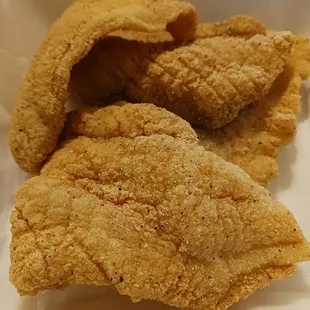 a close up of fried chicken