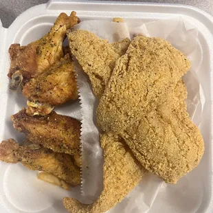 5 Wings &amp; 2 Pieces whiting with fries on the bottom.
