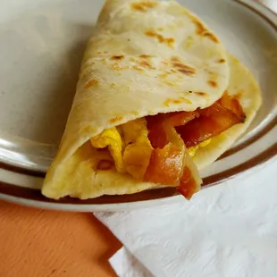 egg and bacon taco - house made fresh flour tortillas