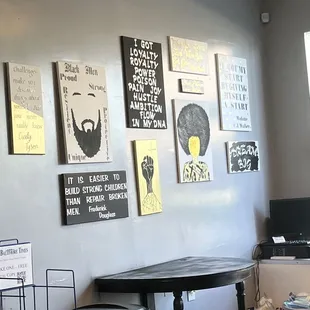 ows a wall of posters