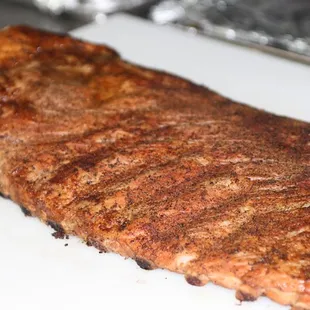 ows a steak on a cutting board