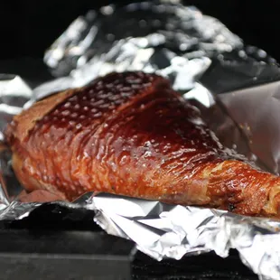 ows a pork wrapped in aluminum foil