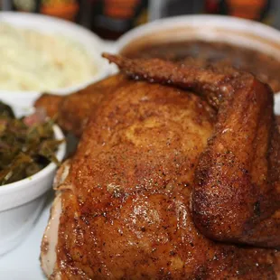 ows a roast chicken with a side of greens