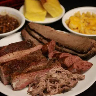 ows a variety of meats and sides