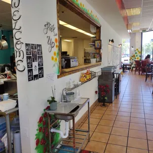 No waiter service.  Customer picks up cooked food on plates at this counter.