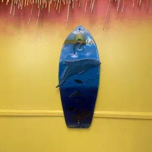 a surfboard on the wall