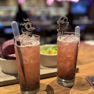 two cocktails on a table