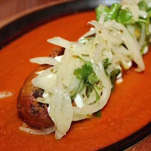 The Chile Relleno was made with a tempura battered Anaheim pepper, chorizo, Oaxaca cheese, tomato frito, and pickled white onion.