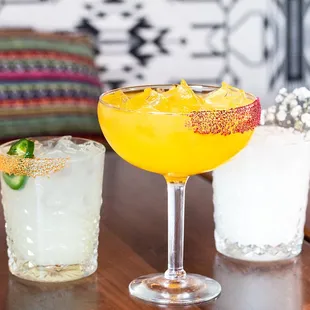 two cocktails on a table