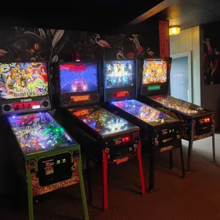 ows a row of pinball machines