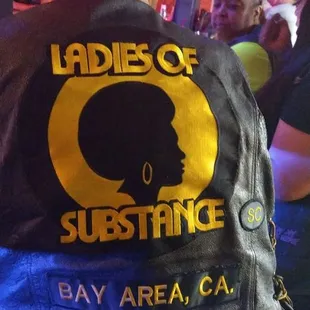 the back of a man's leather jacket