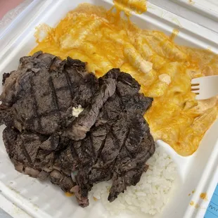 Ribeye plate (the normal plate comes with Mac &amp; cheese and garlic potatoes but we substituted for rice)