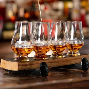 four glasses of whiskey