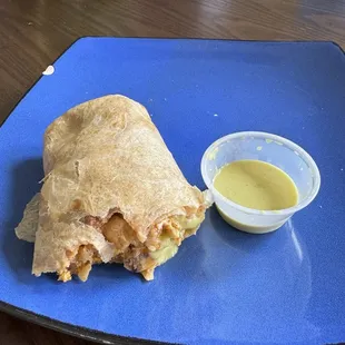 Breakfast burrito and green salsa