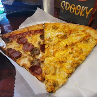 Pepperoni and sausage slice and buffalo chicken slice