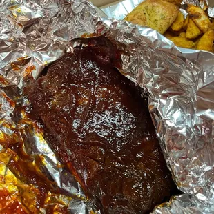 Ribs are fall off the bone tender...