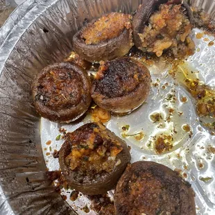 Stuffed Mushrooms that needed cheese or not to be over cooked. Dry... oily.