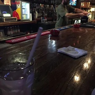 a man serving a drink