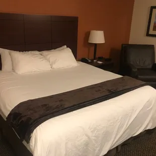 The bed is large and comfortable.