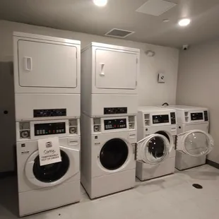 $1.75 wash $1.5 dry you can exchange quarters at the front desk