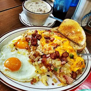 Hash n Eggs with cup of Sausage Gravy Delightful Delicious