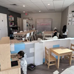 two children playing in the playroom