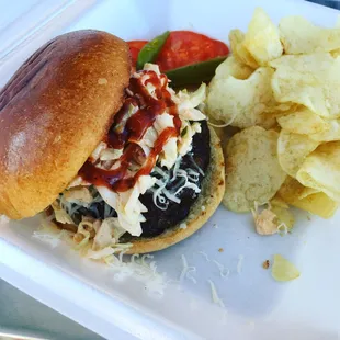 "Smoked Sausage Burger" 1/3 pound smoked sausage patty, served on Brioche bun, topped with white cheddar, slaw and smoked habanero sauce