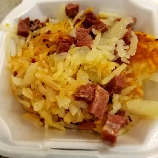 What exists below potatoes in Corned Beef Hash