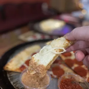 Garlic cheesy bread dipped into the southwest sauce.