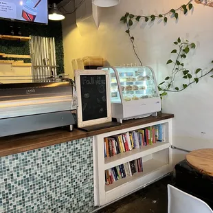 a counter with a microwave on it