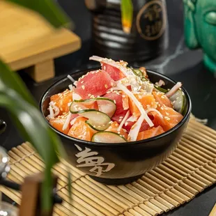  bowl of sushi and chopsticks