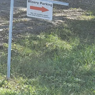 a sign in the grass