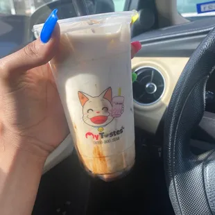 BROWN SUGAR MILK TEA. With light boba.  ( tall  super cute Asian guy made it)  they all so good but he&apos;s cute lol