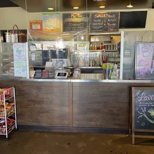 the front counter of a coffee shop