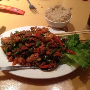 Chicken, shrimp, pepper and green beans in a spicy brown sauce.  Awesome!