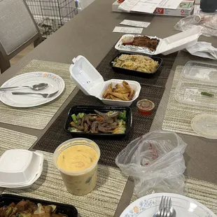 a long table with plates of food