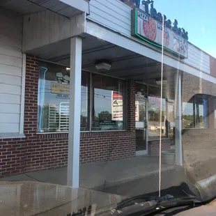 Storefront photo from parking lot while in car