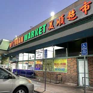 a car parked in front of it