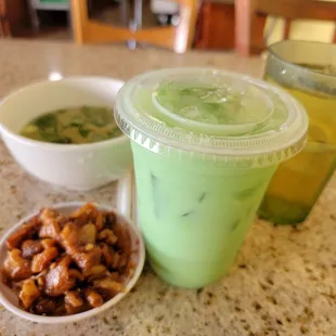 Fried fatty pieces, soup, Mungbean drink, and iced tea