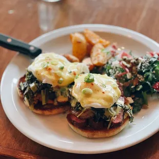 *Special* Surf &amp; Turf Eggs Benedict with shrimp, steak, sautéed greens &amp; jalapeño hollandaise sauce