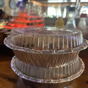 two takeout containers on a table