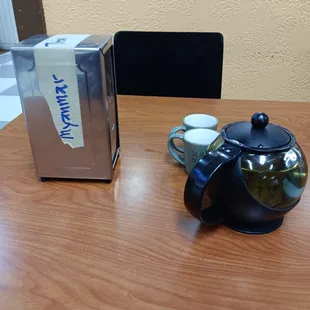 Tea and don't steal the napkin holder.