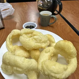 Burmese donut with plum sauce and tea