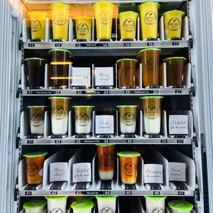 a vending machine filled with jars of food