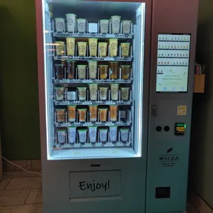 Next to Farmer's Fridge before El station entrance in Block 37.