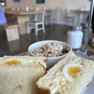 Egg salad sandwich and side of couscous