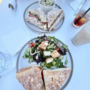 Turkey sandwhich with quinoa salad and caprese sandwhich with green salad